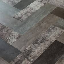 Pose et remplacement d'un sol PVC en vinyle imitation parquet pour un logement social à Bourgoin-Jallieu près de Lyon